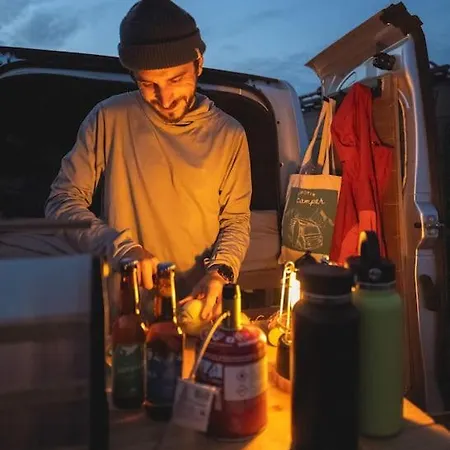 Lofoten E-campervan Pick-up Moskenes Ferry Pier Camping *