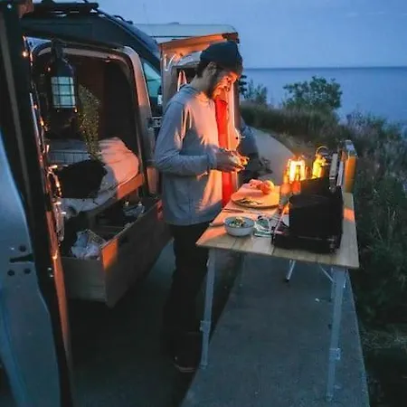 Camping Lofoten E-campervan Pick-up Moskenes Ferry Pier